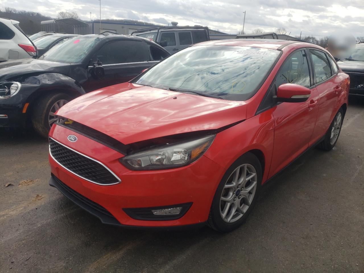 Photo 2 from auction – 2015 FORD FOCUS SE with VIN 1FADP3F21FL244597