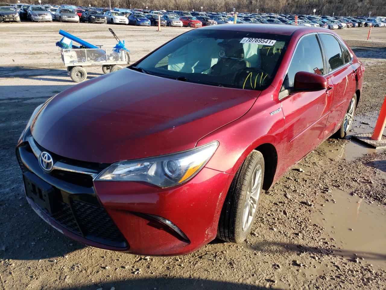 Photo 2 from auction – 2016 TOYOTA CAMRY HYBR with VIN 4T1BD1FK0GU183331