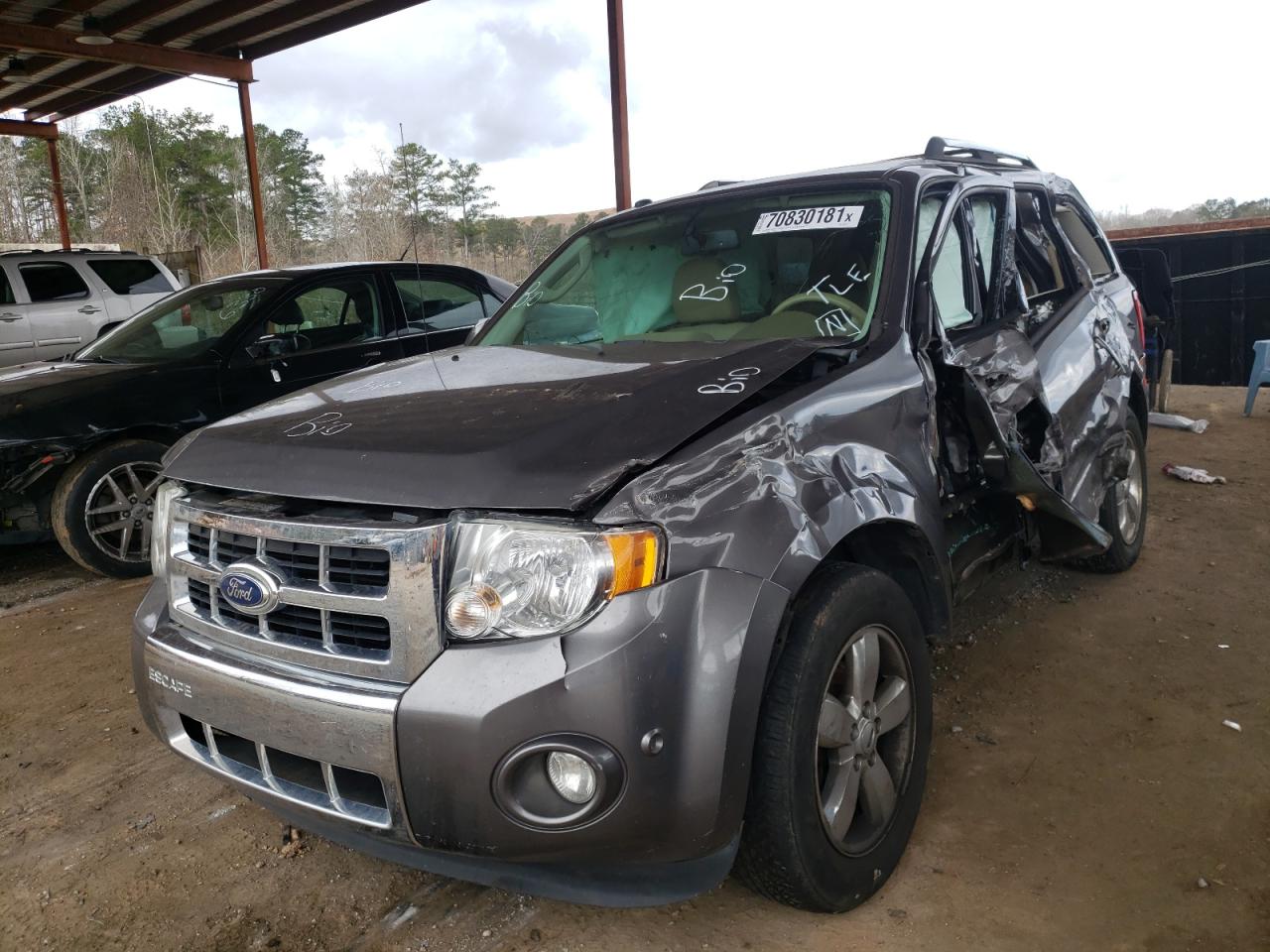 Photo 2 from auction – 2011 FORD ESCAPE LIM with VIN 1FMCU0EG5BKB50972