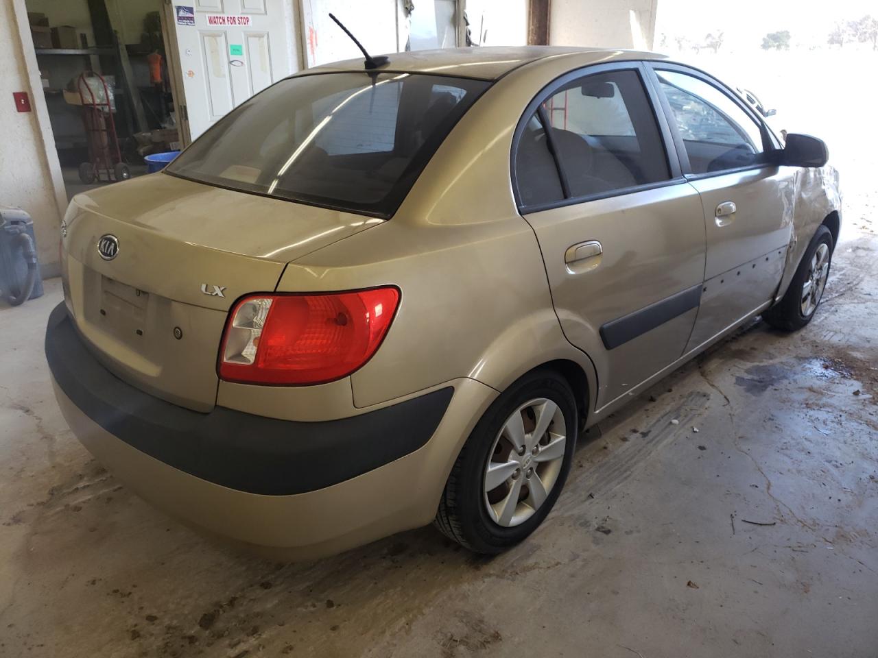 Photo 4 from auction – 2009 KIA RIO BASE with VIN KNADE223496464664
