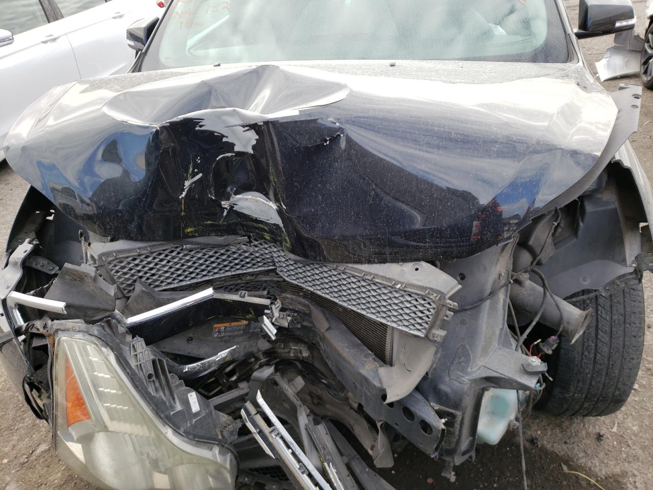 Photo 12 from auction – 2012 CHEVROLET TRAVERSE L with VIN 1GNKRJED2CJ130903