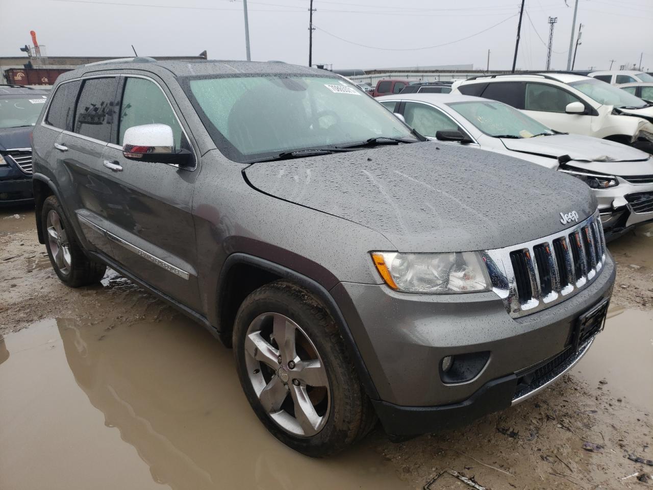 JEEP GRAND CHER 2011 with VIN 1J4RR5GT9BC696234 - Photo from auction