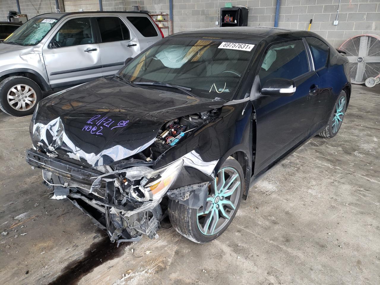 Photo 2 from auction – 2015 TOYOTA SCION TC with VIN JTKJF5C75FJ003593