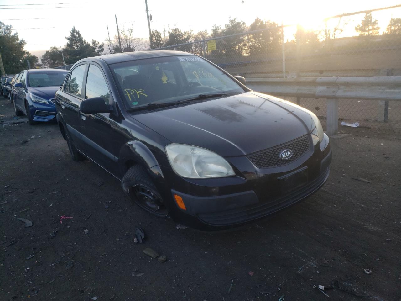 KIA RIO 2006 with VIN KNADE123766079556 - Photo from auction