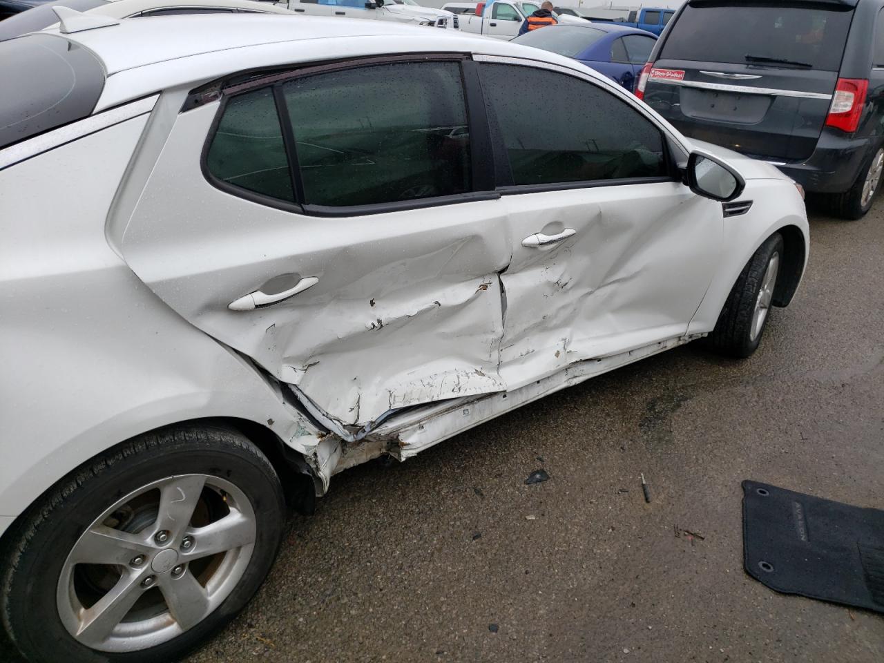 Photo 9 from auction – 2015 KIA OPTIMA LX with VIN KNAGM4A71F5530850