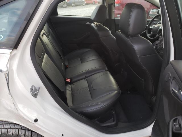 Photo 6 from auction – 2014 FORD FOCUS TITA with VIN 1FADP3J2XEL173048