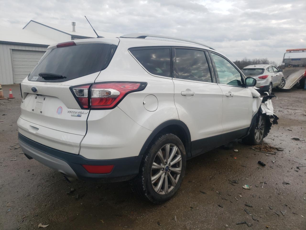 Photo 4 from auction – 2017 FORD ESCAPE TIT with VIN 1FMCU9JD9HUC89547