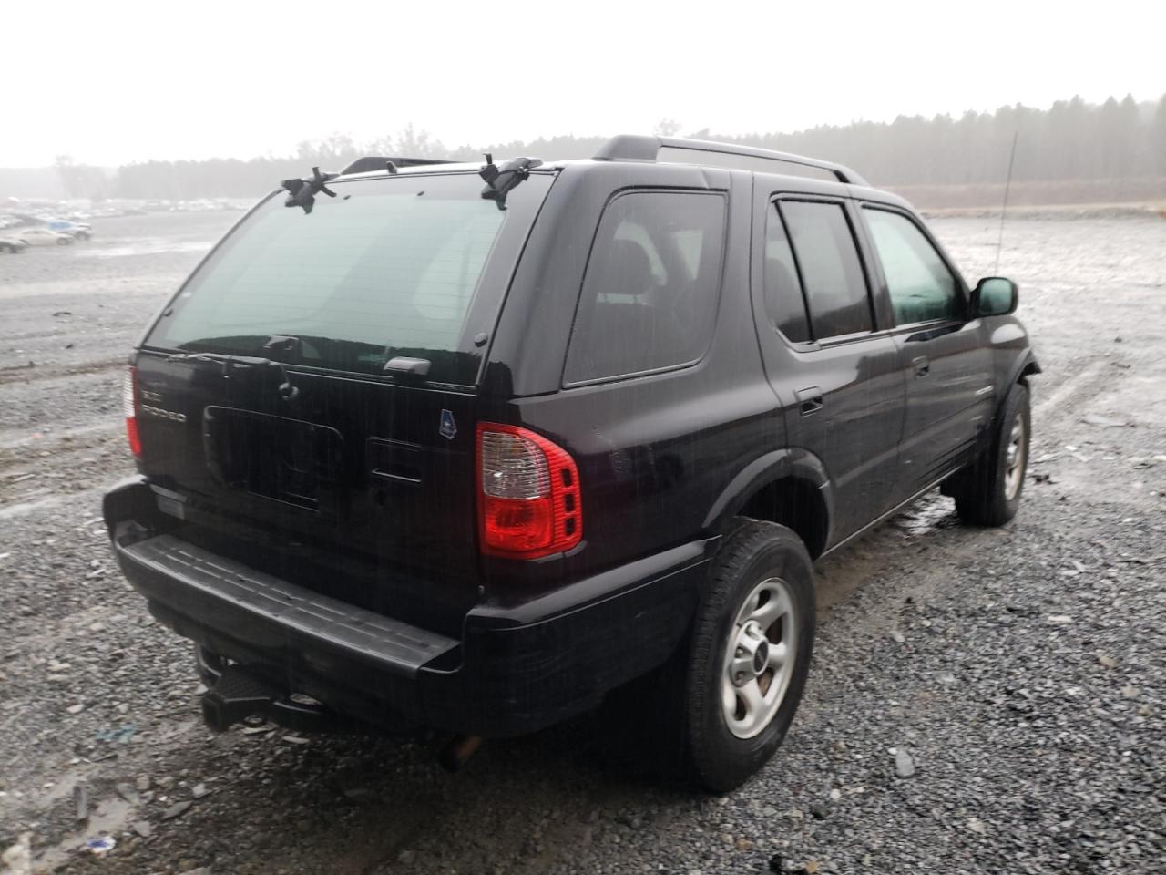 Photo 17 from auction – 2003 ISUZU RODEO with VIN 4S2CK58W634305971