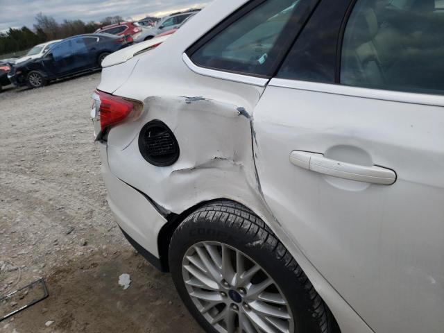 Photo 9 from auction – 2014 FORD FOCUS TITA with VIN 1FADP3J2XEL173048