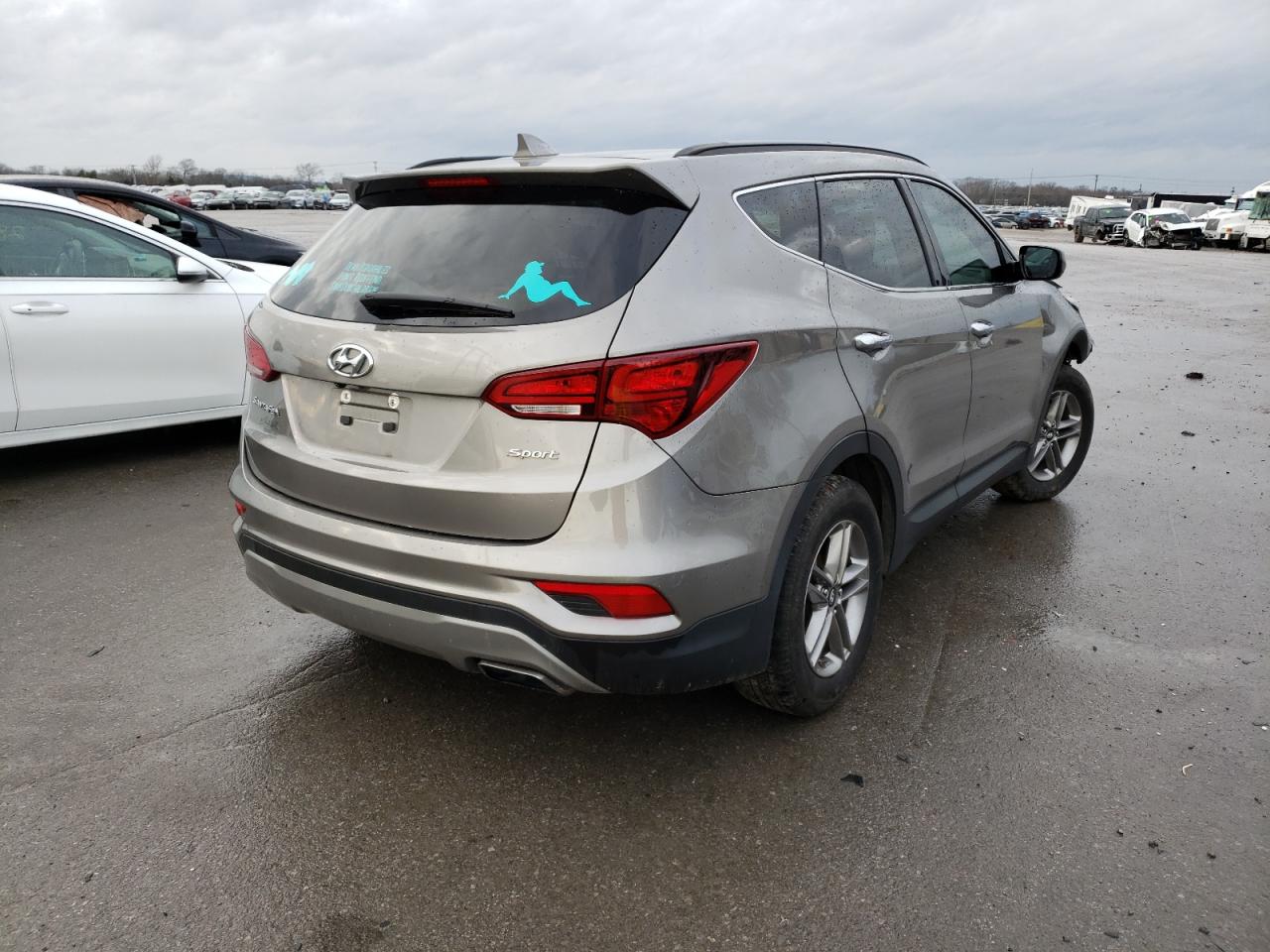Photo 4 from auction – 2017 HYUNDAI SANTA FE S with VIN 5NMZU3LBXHH003641