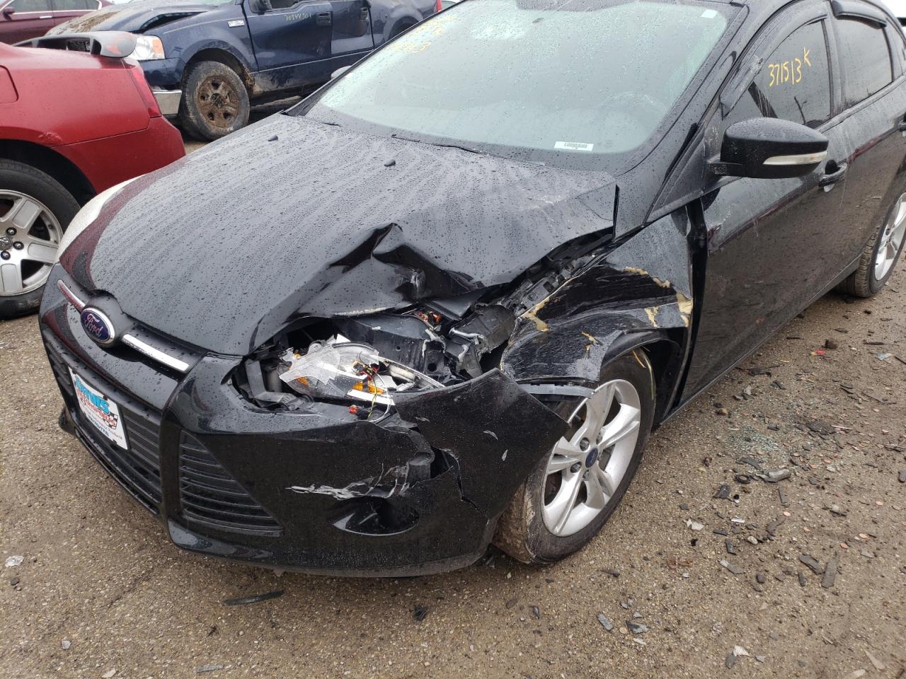 Photo 9 from auction – 2013 FORD FOCUS SE with VIN 1FADP3F25DL371513