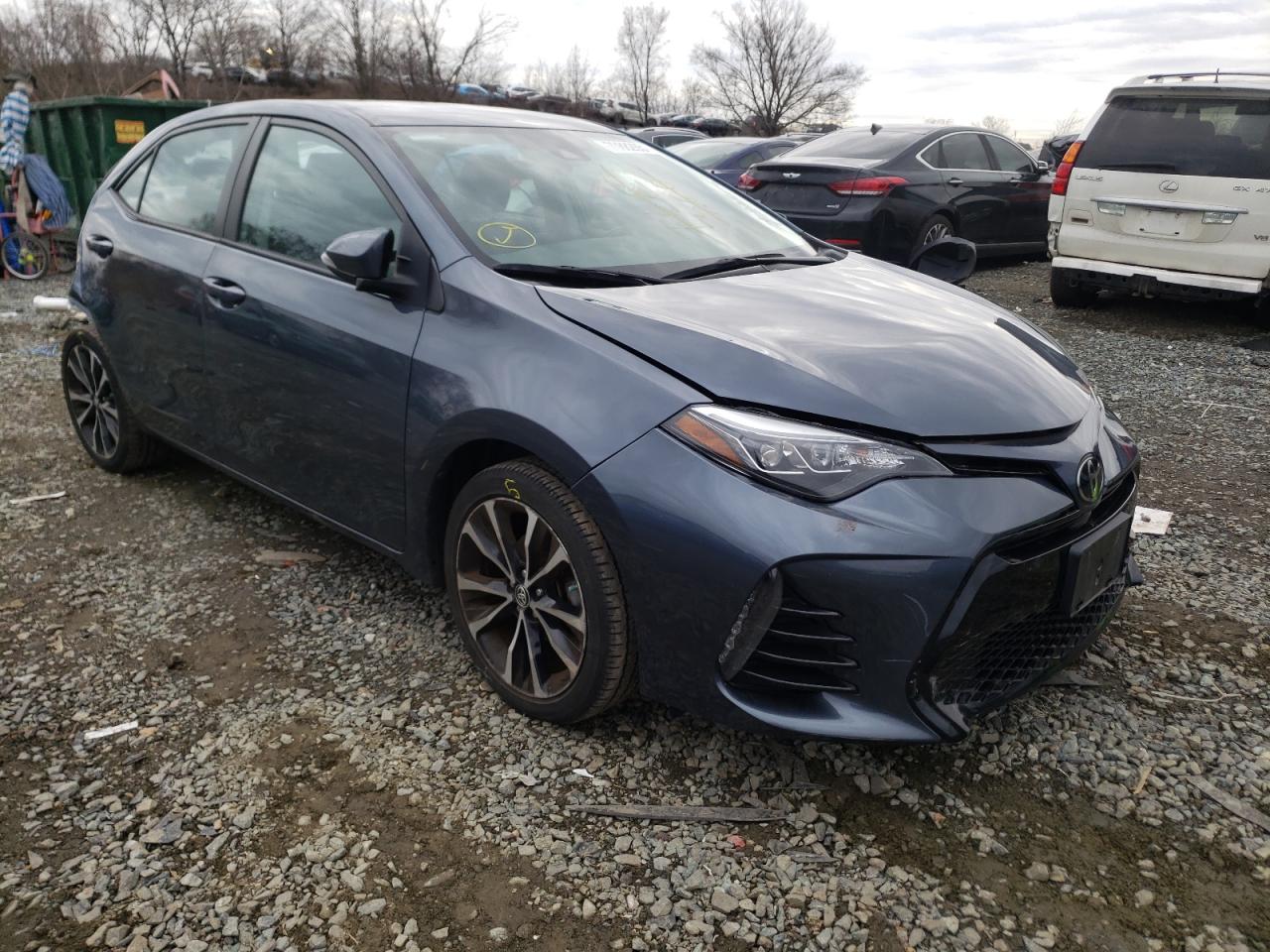 TOYOTA COROLLA L 2017 with VIN 2T1BURHE1HC932369 - Photo from auction