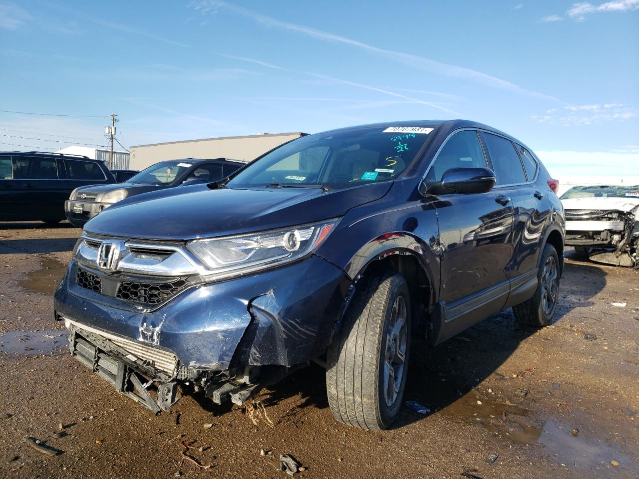Photo 2 from auction – 2018 HONDA CR-V EX with VIN 7FARW2H50JE026994