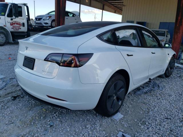 Photo 4 from auction – 2022 TESLA MODEL 3 with VIN 5YJ3E1EB2NF103444