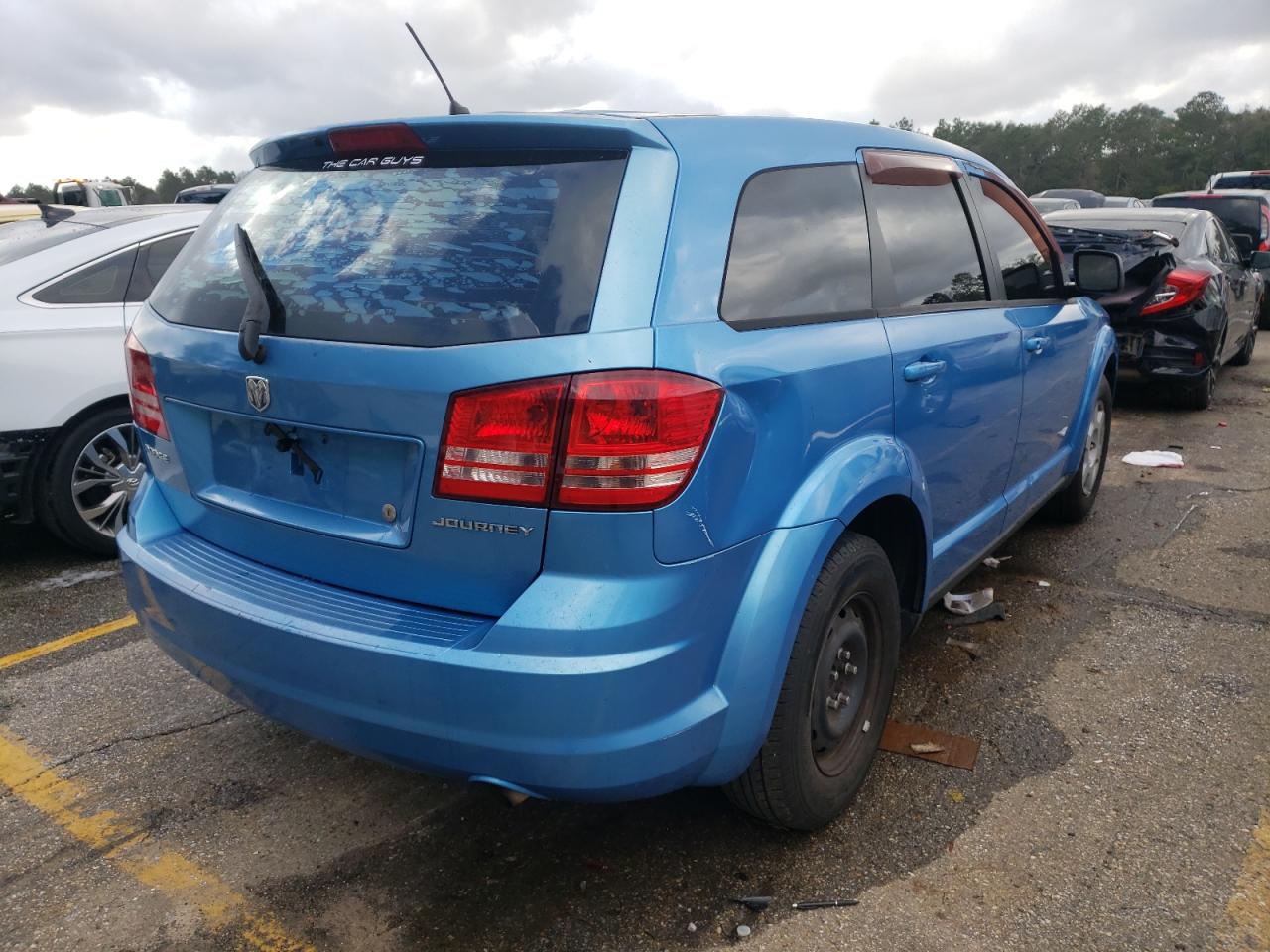 Photo 4 from auction – 2009 DODGE JOURNEY SE with VIN 3D4GG47B99T529913