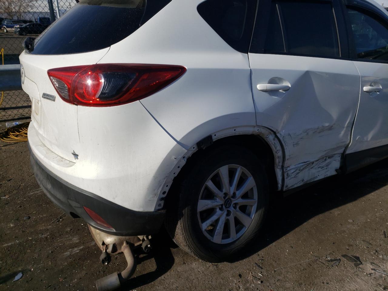 Photo 9 from auction – 2014 MAZDA CX-5 TOURI with VIN JM3KE4CY4E0377254