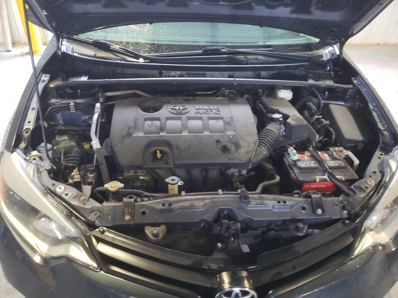 Photo 7 from auction – 2014 TOYOTA COROLLA EC with VIN 5YFBPRHE2EP079435