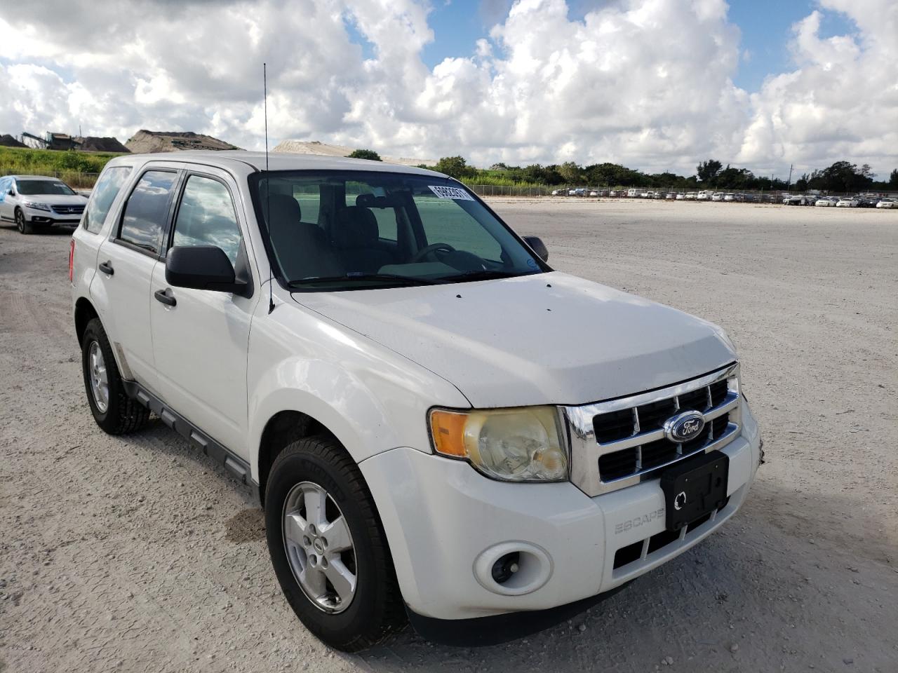 FORD ESCAPE XLS 2011 with VIN 1FMCU0C77BKB70501 - Photo from auction
