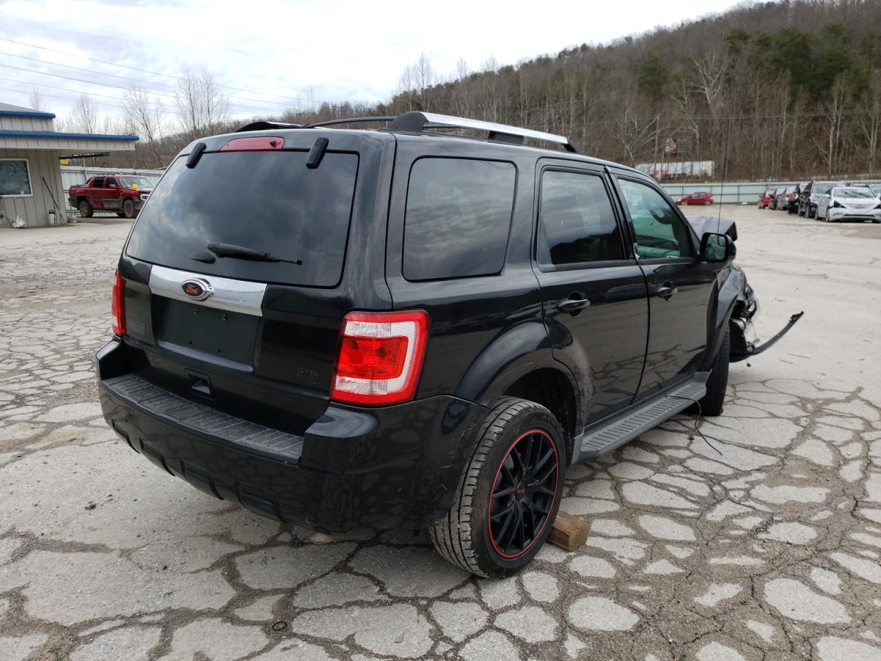 Photo 4 from auction – 2011 FORD ESCAPE LIM with VIN 1FMCU9EG7BKB12194