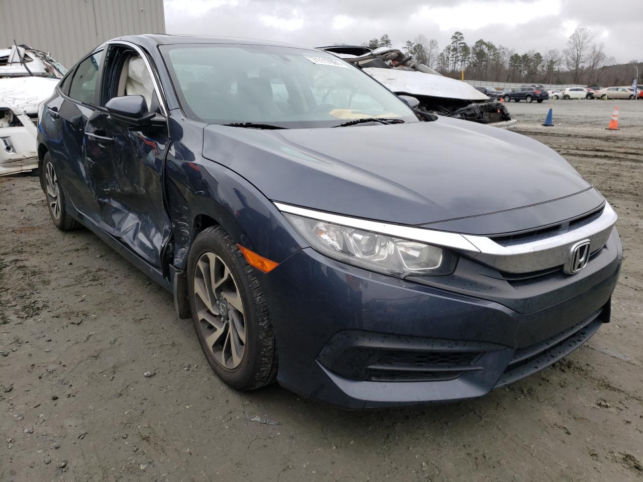 Photo 1 from auction – 2017 HONDA CIVIC EX with VIN 2HGFC2F72HH572116