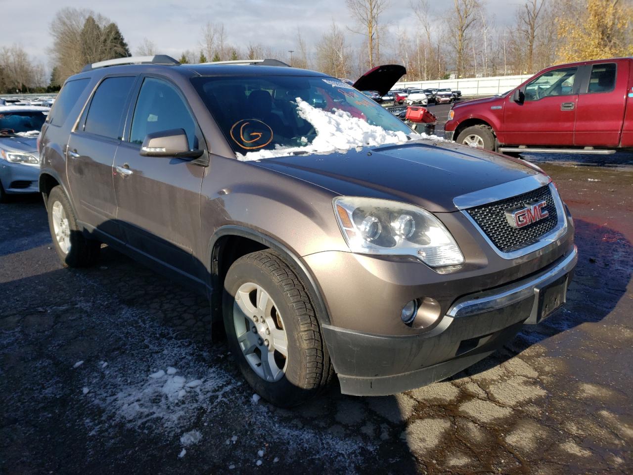 GMC ACADIA SLE 2010 with VIN 1GKLRLED0AJ265565 - Photo from auction