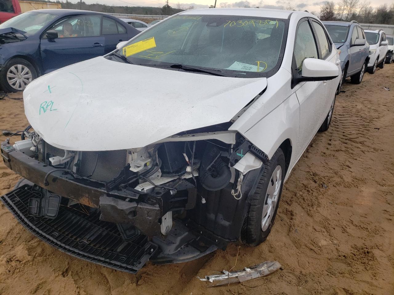 Photo 2 from auction – 2017 TOYOTA COROLLA L with VIN 5YFBURHEXHP663093