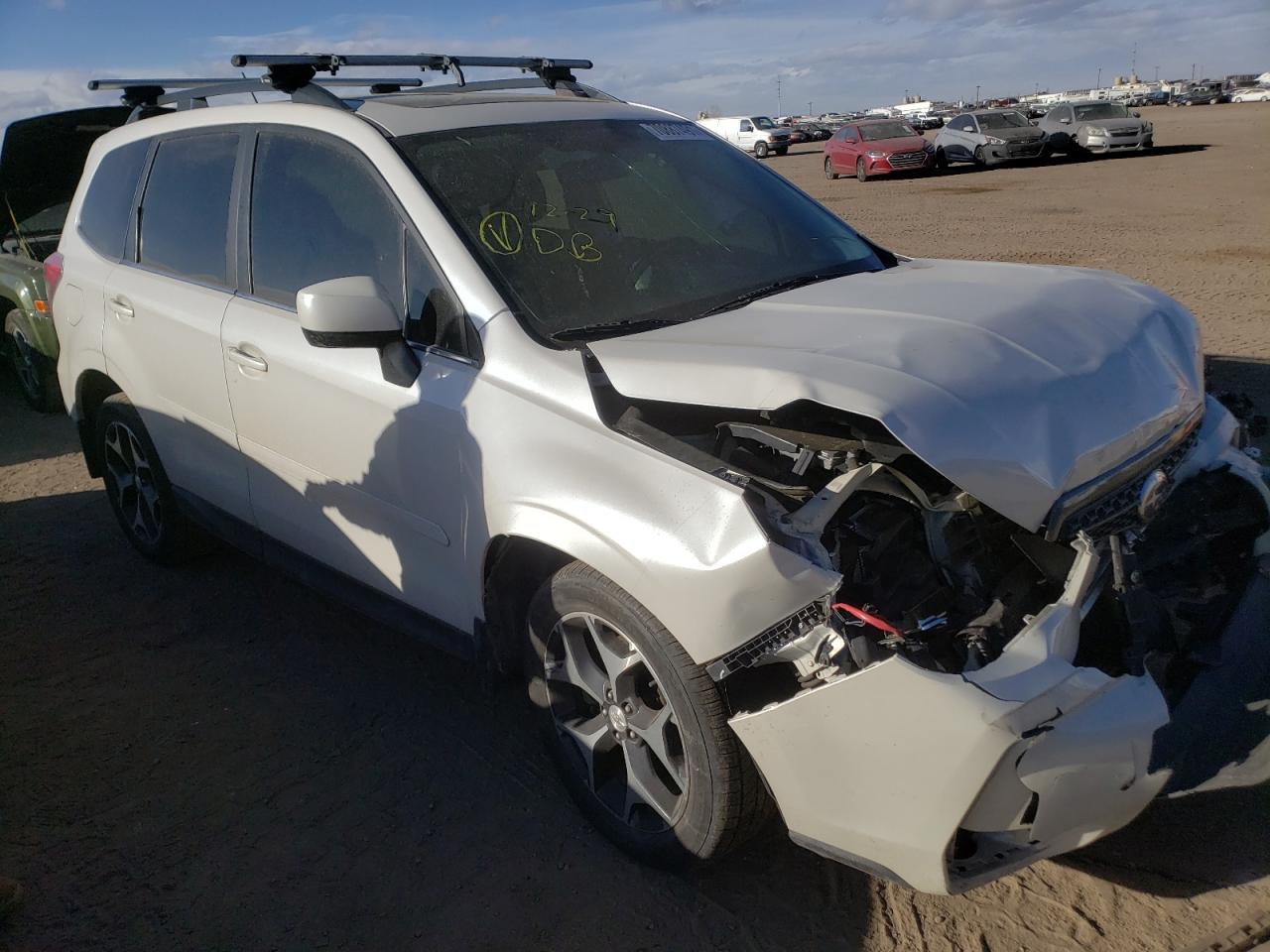 SUBARU FORESTER 2 2014 with VIN JF2SJGDC1EH540888 - Photo from auction