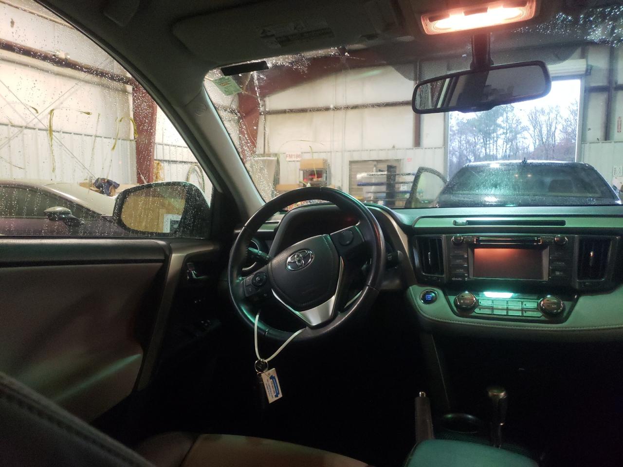 Photo 9 from auction – 2014 TOYOTA RAV4 LIMIT with VIN 2T3YFREV2EW091382