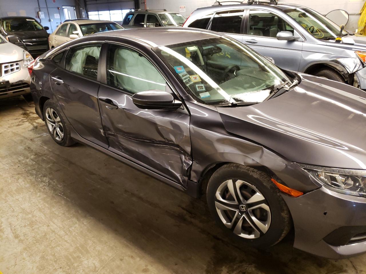 Photo 9 from auction – 2016 HONDA CIVIC LX with VIN 19XFC2F55GE012131
