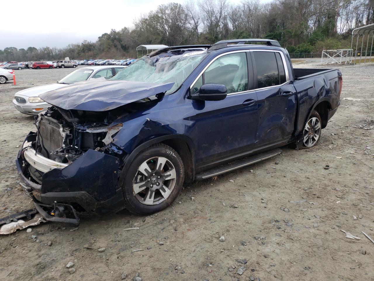Photo 2 from auction – 2017 HONDA RIDGELINE with VIN 5FPYK2F64HB005775
