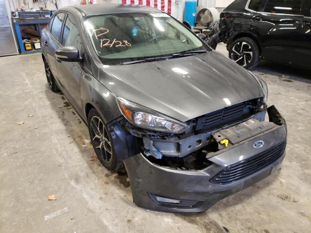 FORD FOCUS SE 2017 with VIN 1FADP3FEXHL230050 - Photo from auction