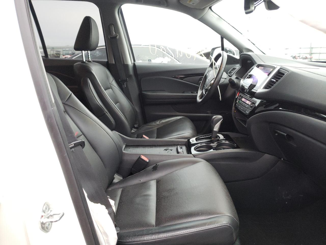 Photo 5 from auction – 2018 HONDA RIDGELINE with VIN 5FPYK3F76JB004700