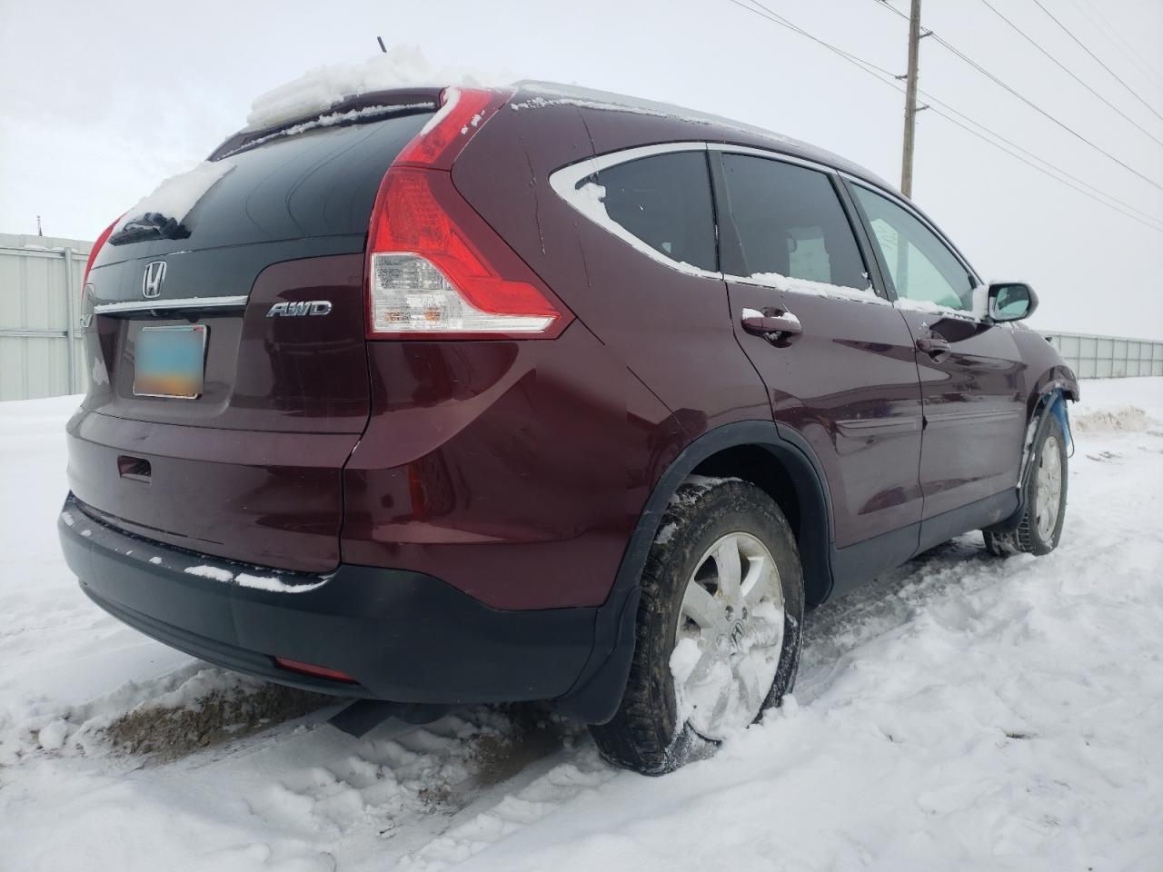 Photo 4 from auction – 2014 HONDA CR-V EXL with VIN 5J6RM4H76EL097998