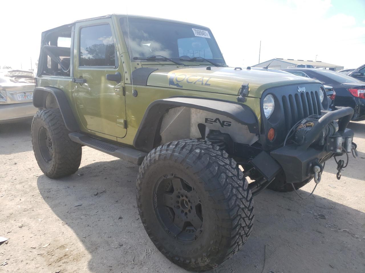 JEEP WRANGLER S 2010 with VIN 1J4AA2D14AL210305 - Photo from auction