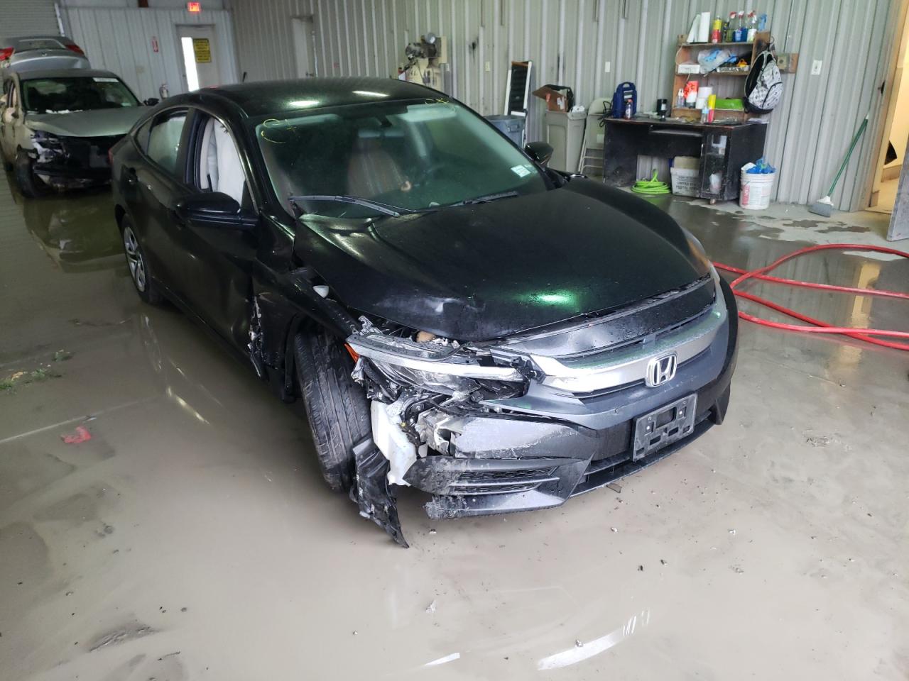 HONDA CIVIC LX 2018 with VIN 2HGFC2F58JH588678 - Photo from auction