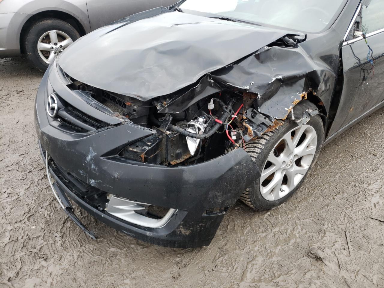 Photo 9 from auction – 2009 MAZDA 6 S with VIN 1YVHP82B495M01136