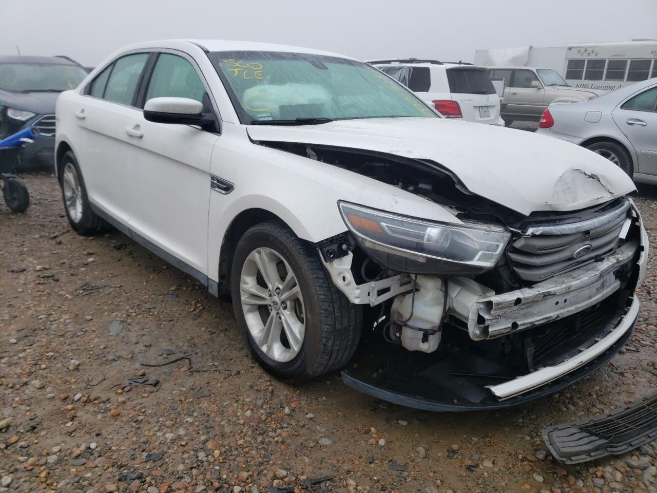 FORD TAURUS SEL 2015 with VIN 1FAHP2E80FG160989 - Photo from auction