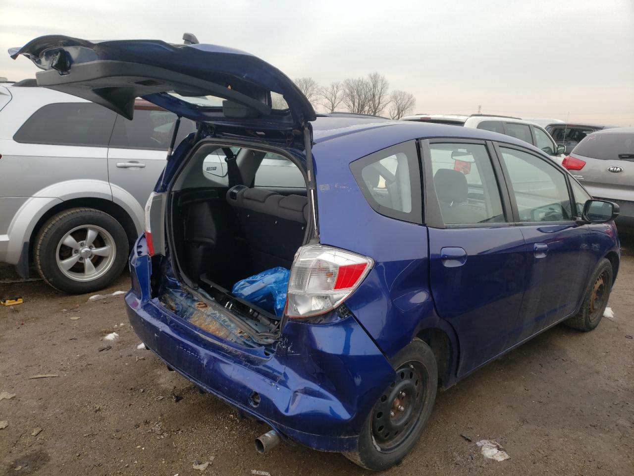 Photo 4 from auction – 2009 HONDA FIT with VIN JHMGE87299S071493