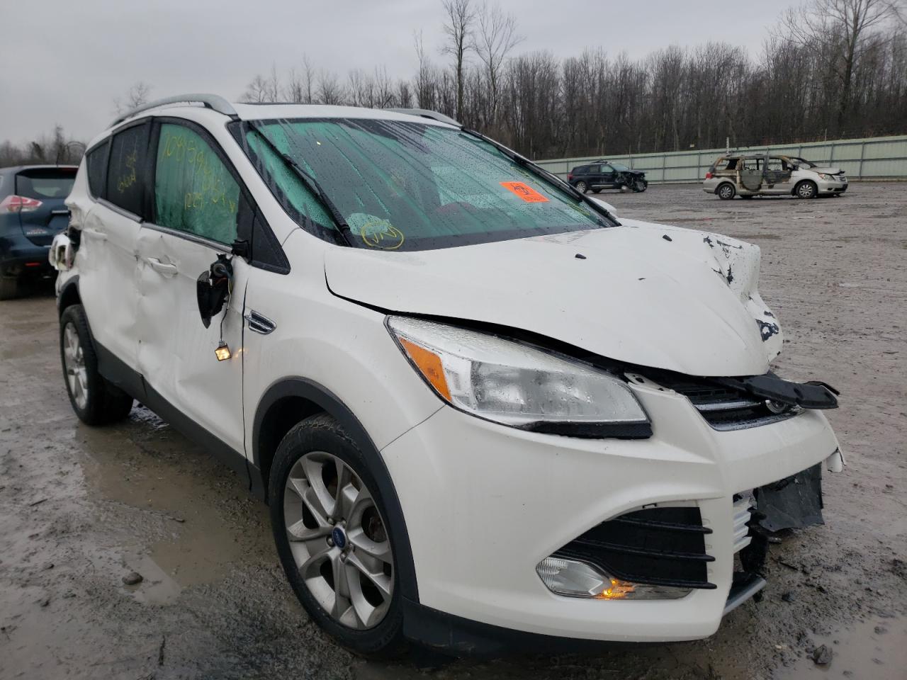 FORD ESCAPE TIT 2016 with VIN 1FMCU9JX1GUA73748 - Photo from auction