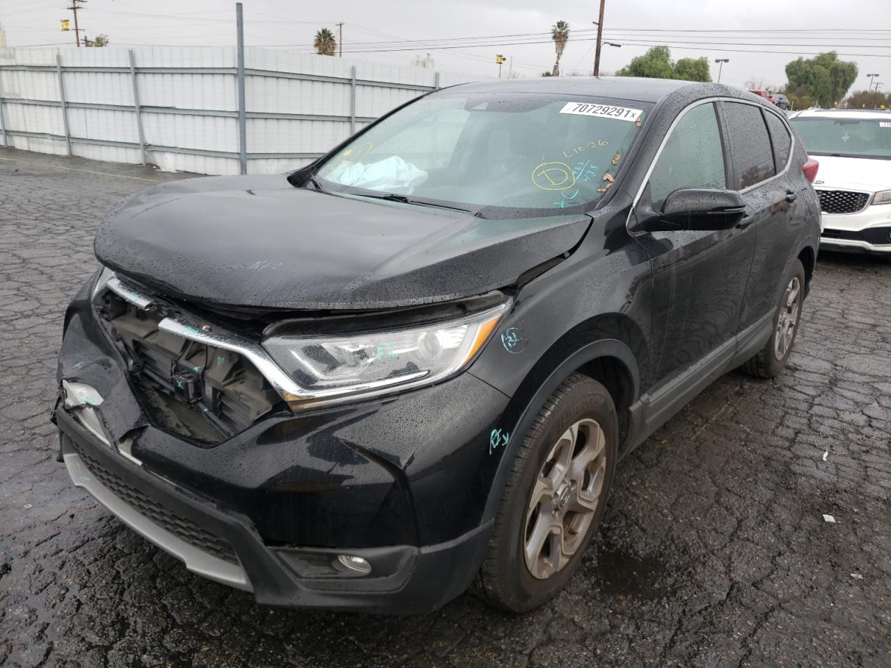Photo 2 from auction – 2019 HONDA CR-V EX with VIN 7FARW1H56KE032259