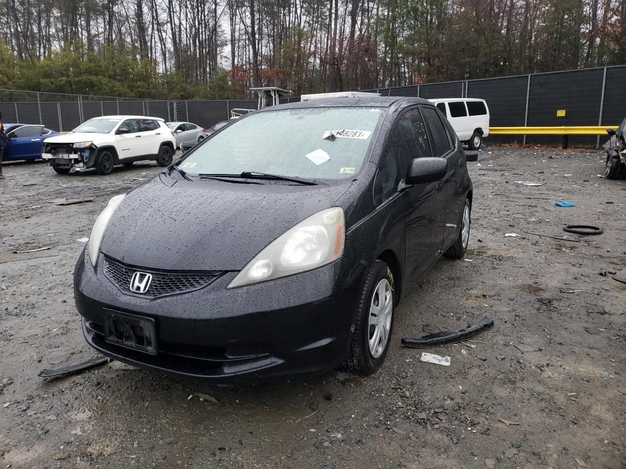 Photo 2 from auction – 2009 HONDA FIT with VIN JHMGE87209S038592