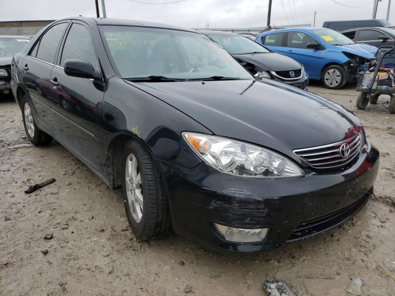 TOYOTA CAMRY LE 2005 with VIN 4T1BF30K05U099053 - Photo from auction