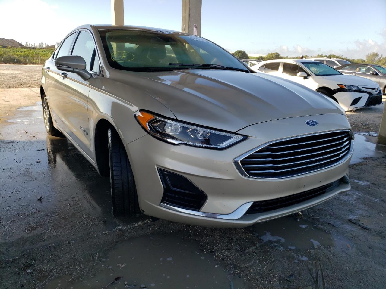 FORD FUSION SEL 2019 with VIN 3FA6P0MU4KR214680 - Photo from auction