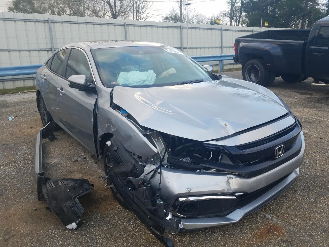 HONDA CIVIC EX 2019 with VIN 19XFC1F36KE003746 - Photo from auction