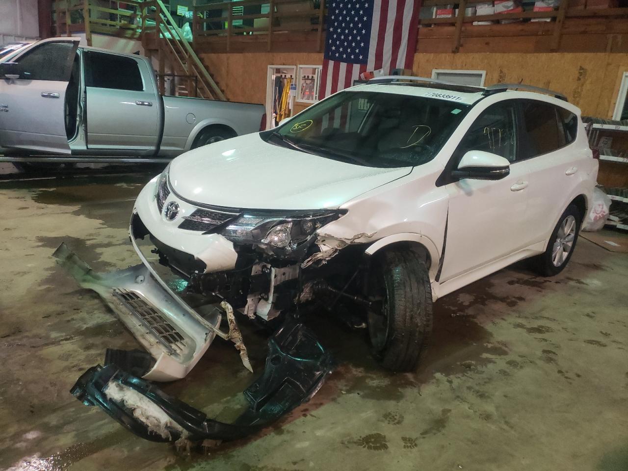 Photo 2 from auction – 2014 TOYOTA RAV4 LIMIT with VIN 2T3YFREV2EW091382
