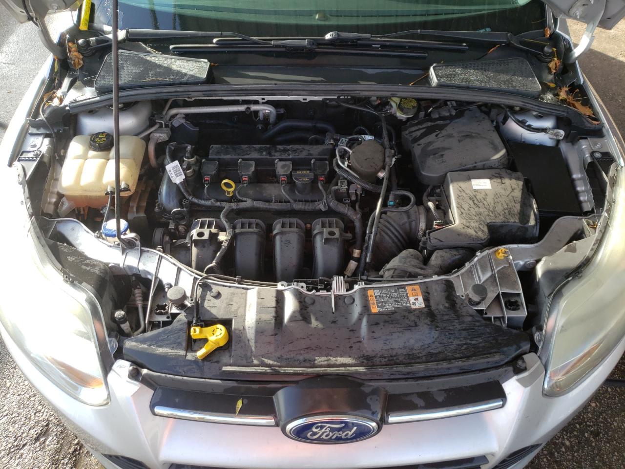 Foto 7 de la subasta – 2014 FORD FOCUS SE con VIN 1FADP3K20EL378666