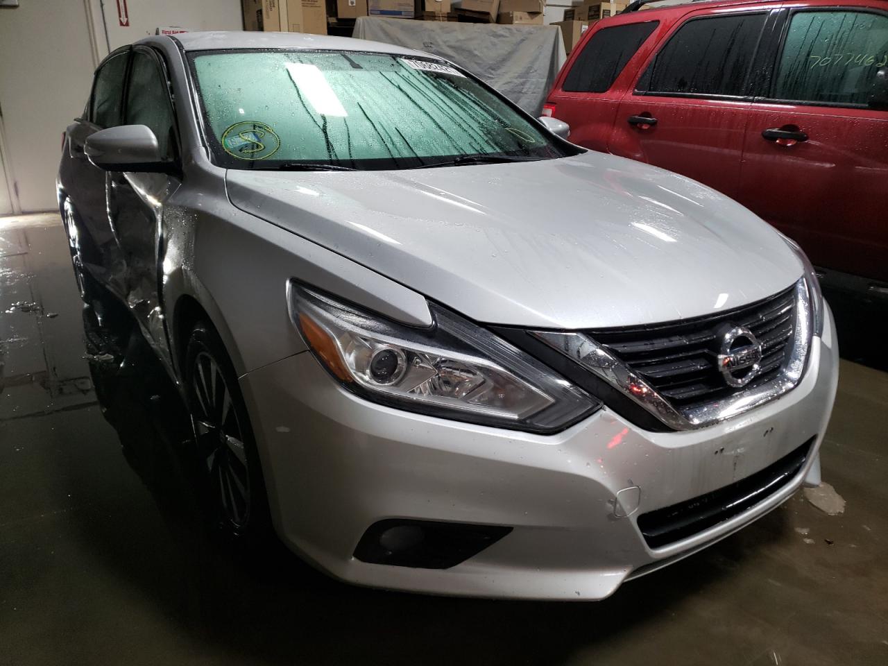 NISSAN ALTIMA 2.5 2018 with VIN 1N4AL3AP6JC165596 - Photo from auction