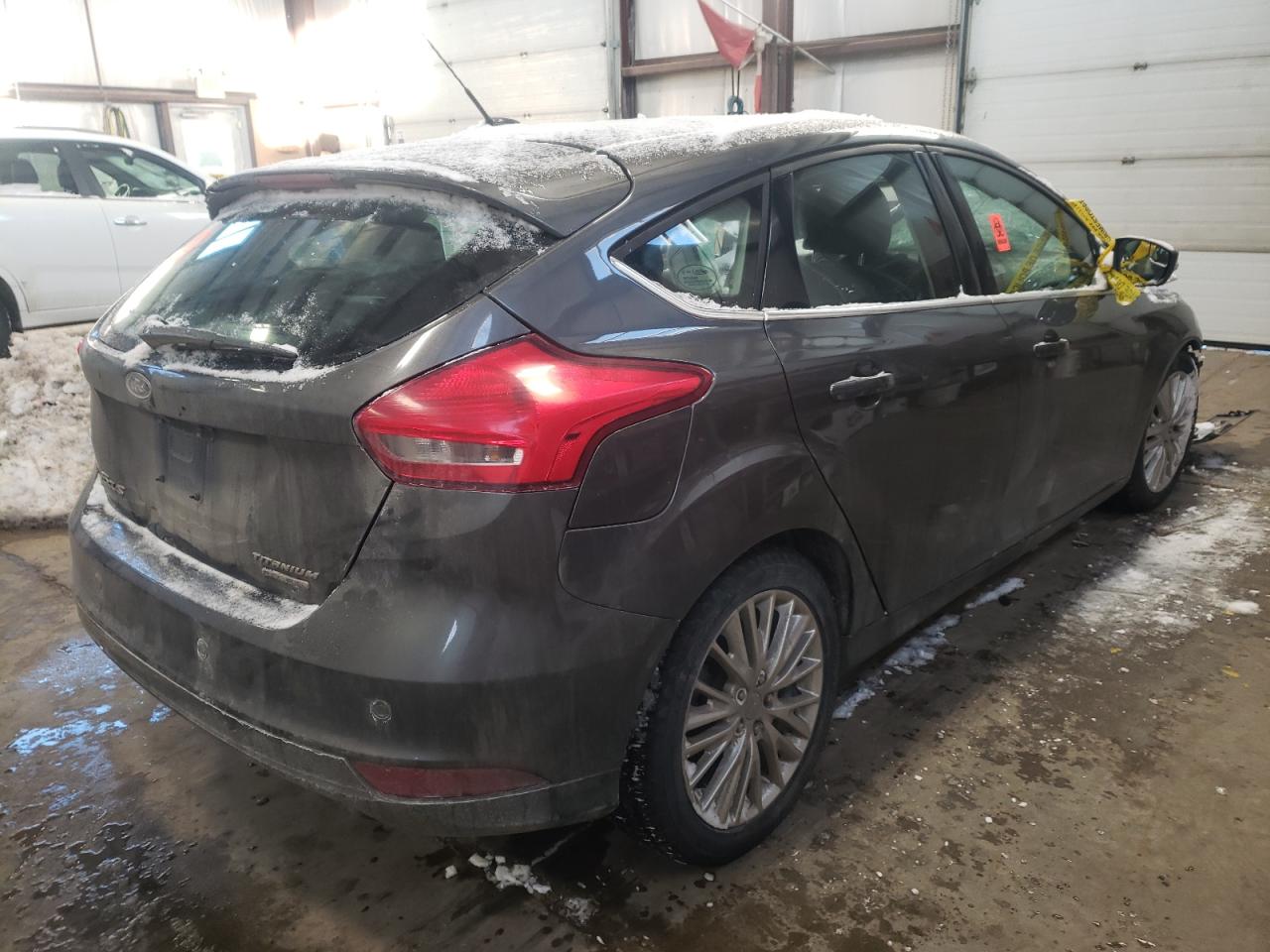 Photo 4 from auction – 2015 FORD FOCUS TITA with VIN 1FADP3N25FL235709