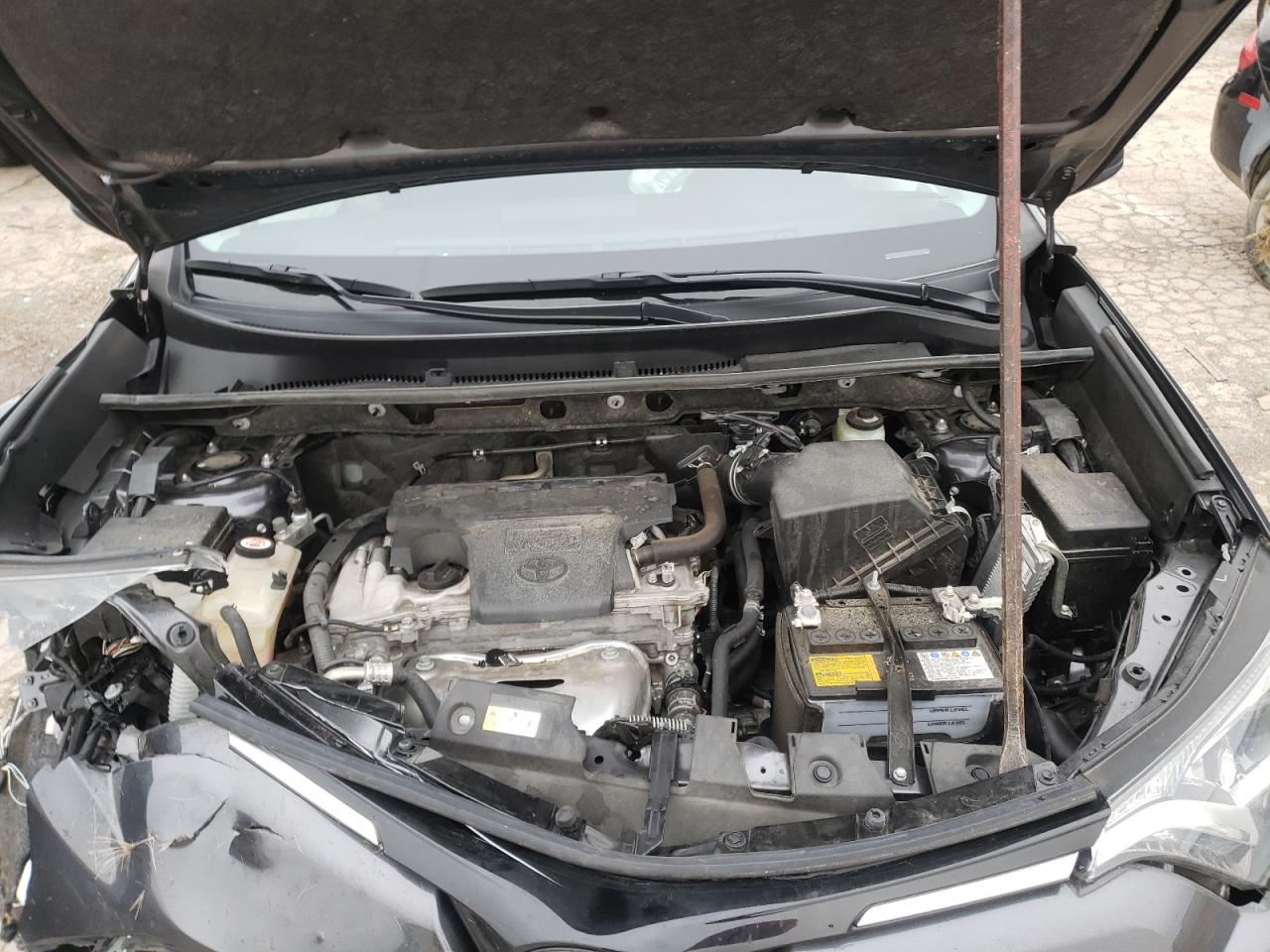 Photo 7 from auction – 2018 TOYOTA RAV4 LE with VIN JTMZFREV8JJ175218