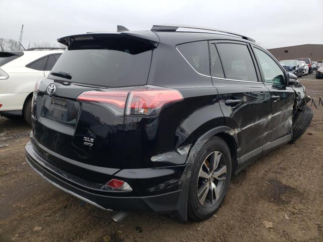 Photo 4 from auction – 2017 TOYOTA RAV4 XLE with VIN 2T3RFREV5HW671895